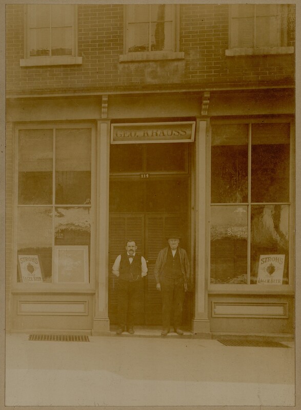 Photograph of John G. Krauss with an unidentified man at 114 E. State Street.